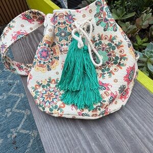 Floral Embroidered Bucket Bag with Green Tassel